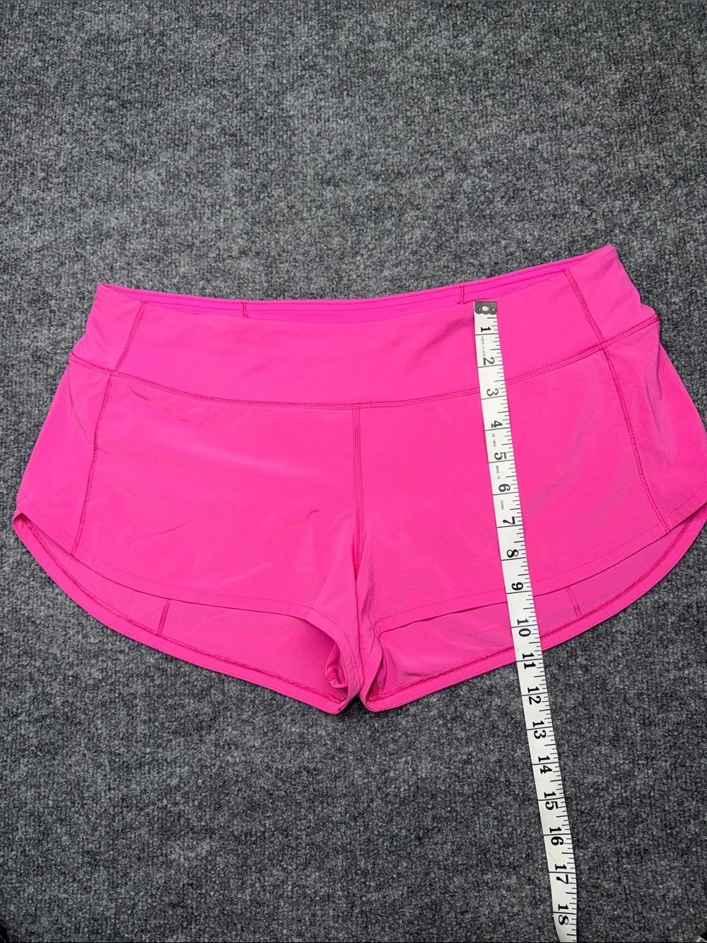 Lululemon Speed Up Shorts in the bright Sonic Pink colorway